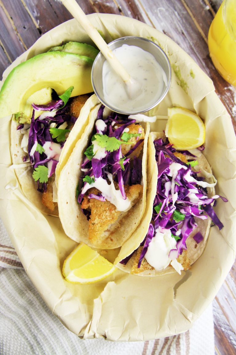 Crispy Fish Tacos with Cabbage Slaw and Lime Crema - The Tasty Bite