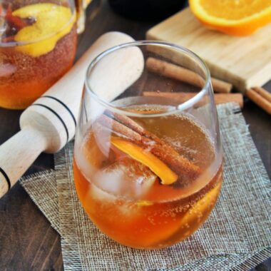 This Japanese Old Fashioned features Suntory Hibiki Whiskey as its star ingredient, complemented by sugar, yuzu bitters for a zesty twist, and a garnish of orange peel.