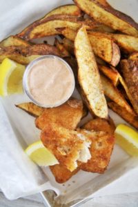 Crispy, golden fillets coated in a zesty beer batter, served with tangy tartar sauce—this Cajin Fish and Chips made with Acadian Redfish is twist on a classic and sure to become your new favorite!