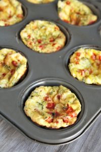 Start your day right with Healthy Breakfast Egg Cups! These portable breakfast egg cups are packed with vegetables and protein, baked to perfection in muffin tins and can be made in advance.