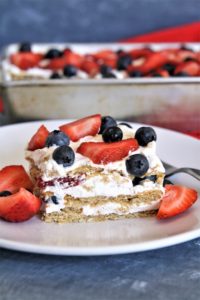 This no-bake Red, White, and Blue Icebox Cake is made with 5 simple ingredients, and is a patriotic dessert perfect for Memorial Day or Fourth of July!