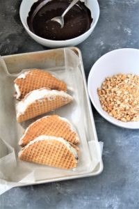 This homemade Choco Taco with taco-shaped waffle cone is filled with vanilla ice cream and topped with chocolate shell and peanuts, just like the iconic treat - the best part is it only requires 4 ingredients!