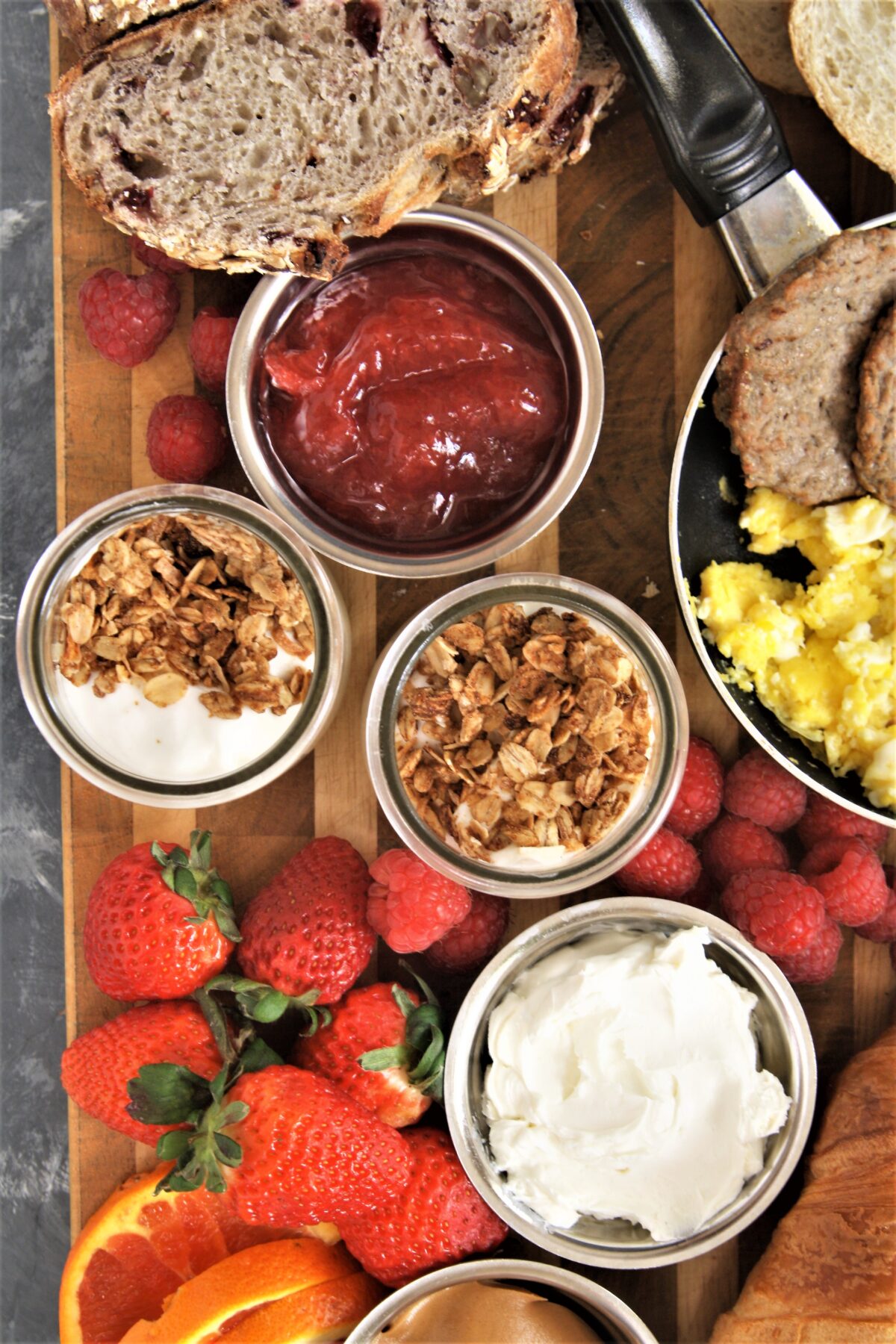 Take your next breakfast or weekend brunch to the next level and serve this fun, delicious, and beautiful breakfast grazing board with a variety of favorite breakfast foods.