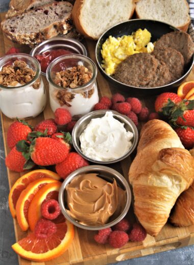 Take your next breakfast or weekend brunch to the next level and serve this fun, delicious, and beautiful breakfast grazing board with a variety of favorite breakfast foods.