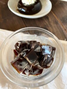 Get your caffeine fix in with Japanese coffee jelly, a refreshing dessert inspired by the anime show "The Disastrous Life of Saiki K" which combines rich coffee flavor with a silky smooth jelly texture.