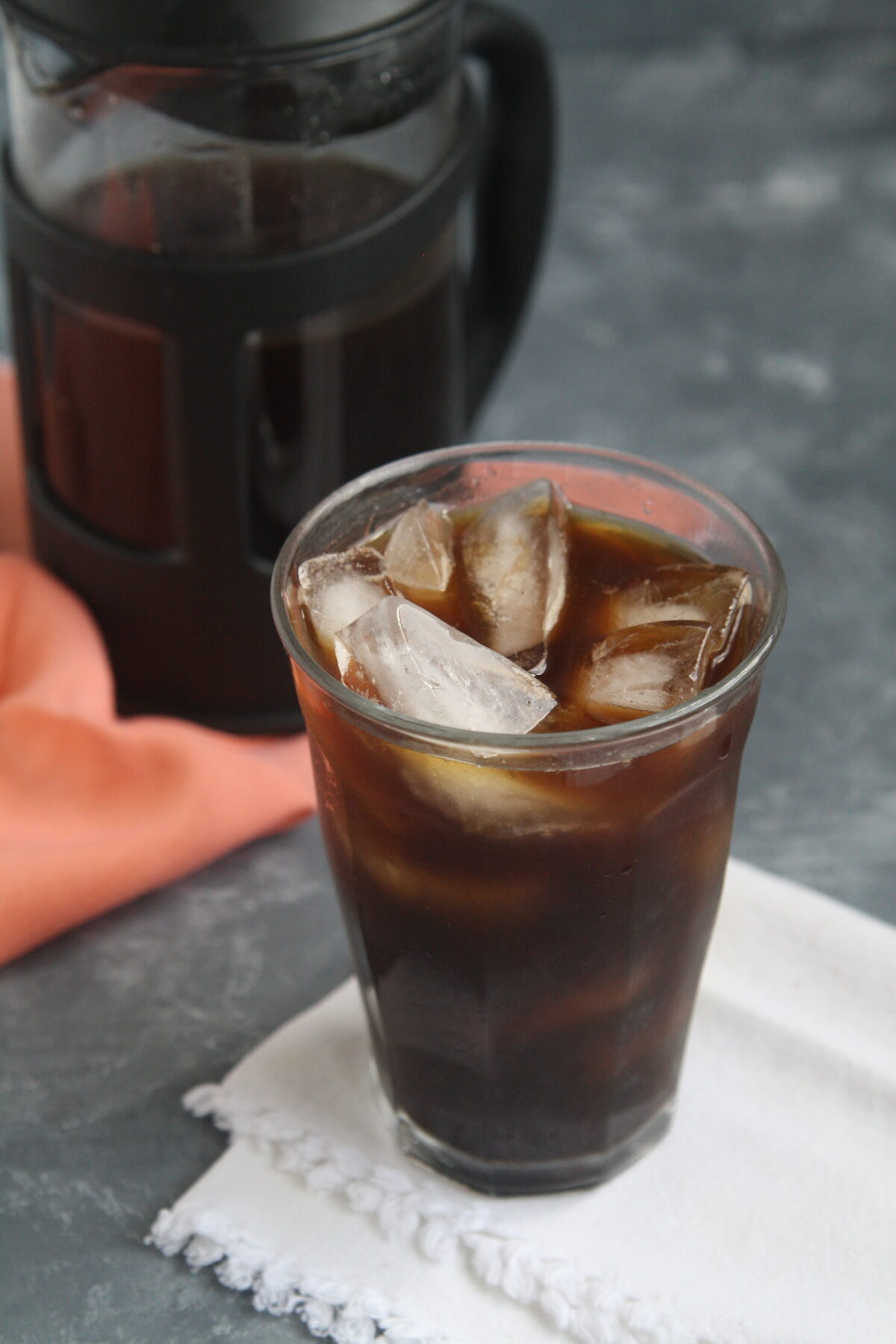 Discover how to craft your own Blue Bottle Cold Brew Coffee at home and enjoy a smooth, rich coffee with lower acidity than regular brews using the cold brewing method with just two ingredients: coffee and water!