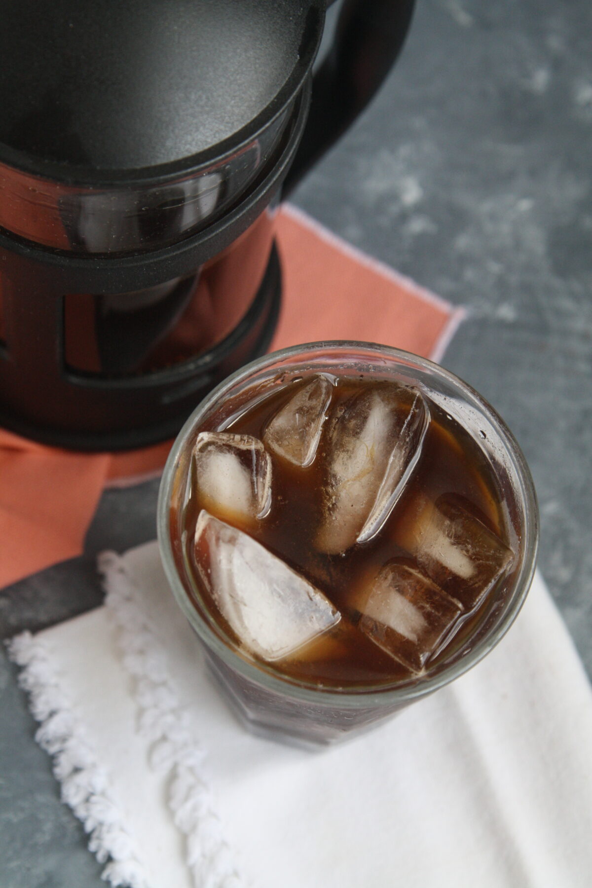 Discover how to craft your own Blue Bottle Cold Brew Coffee at home and enjoy a smooth, rich coffee with lower acidity than regular brews using the cold brewing method with just two ingredients: coffee and water!