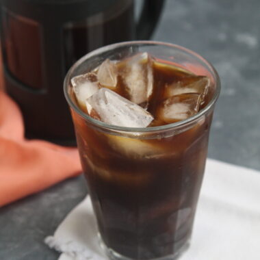 Discover how to craft your own Blue Bottle Cold Brew Coffee at home and enjoy a smooth, rich coffee with lower acidity than regular brews using the cold brewing method with just two ingredients: coffee and water!