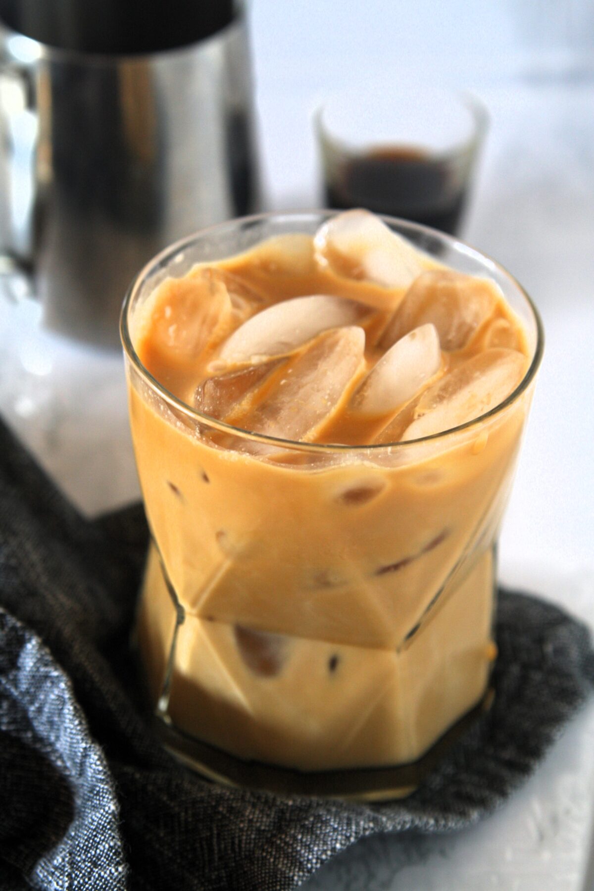 Emma Chamberlain's Cold Brew Iced Coffee Recipe has taken social media by storm. Recreate this refreshing drink with simple ingredients, to be enjoyed over ice or as a base for all kinds of coffee drinks.