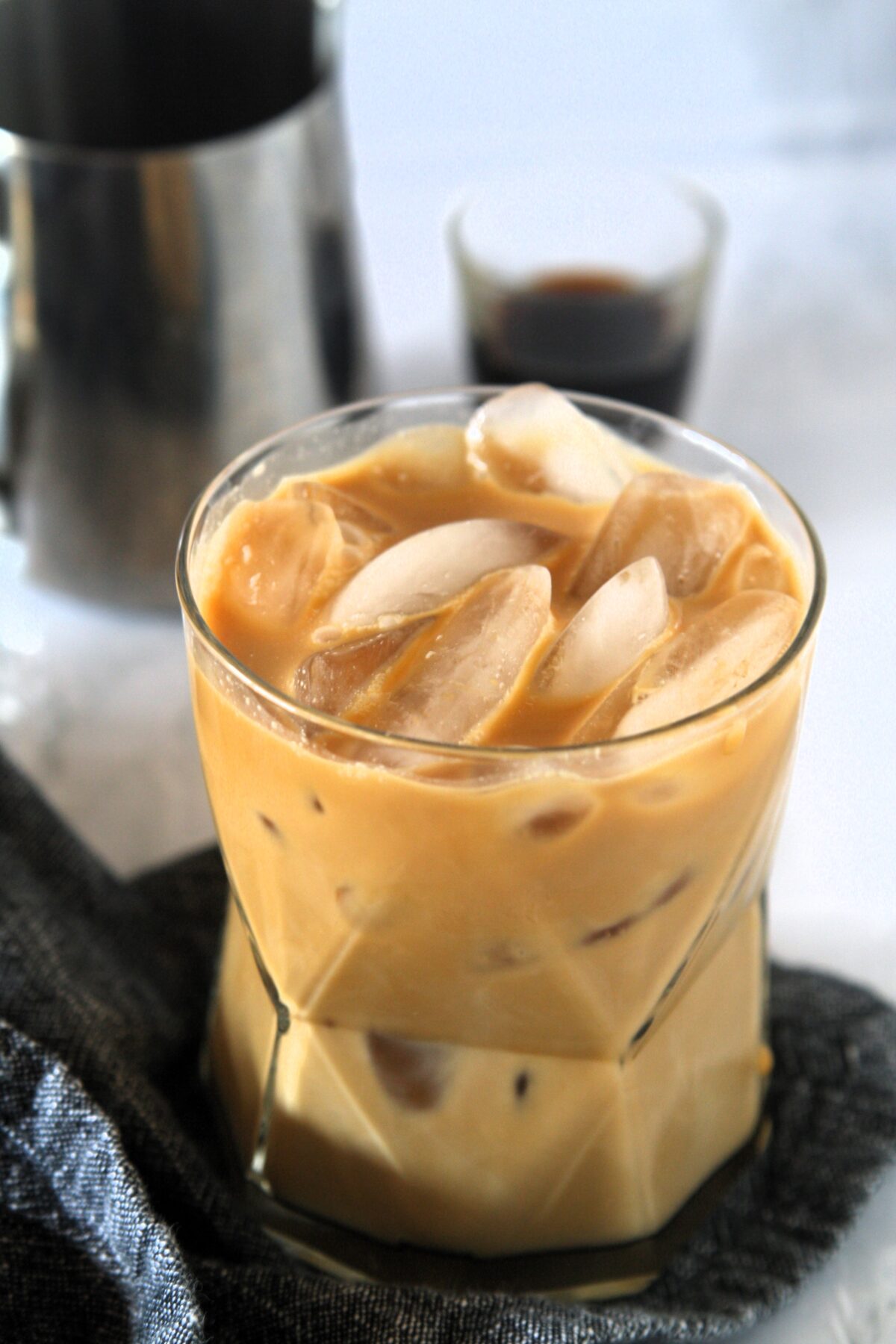 Emma Chamberlain's Cold Brew Iced Coffee Recipe has taken social media by storm. Recreate this refreshing drink with simple ingredients, to be enjoyed over ice or as a base for all kinds of coffee drinks.