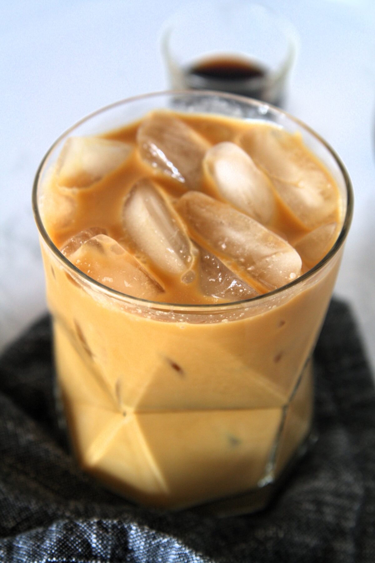 Emma Chamberlain's Cold Brew Iced Coffee Recipe has taken social media by storm. Recreate this refreshing drink with simple ingredients, to be enjoyed over ice or as a base for all kinds of coffee drinks.