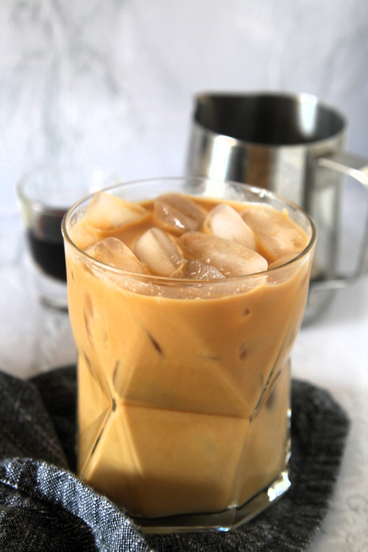 Emma Chamberlain's Cold Brew Iced Coffee Recipe has taken social media by storm. Recreate this refreshing drink with simple ingredients, to be enjoyed over ice or as a base for all kinds of coffee drinks.