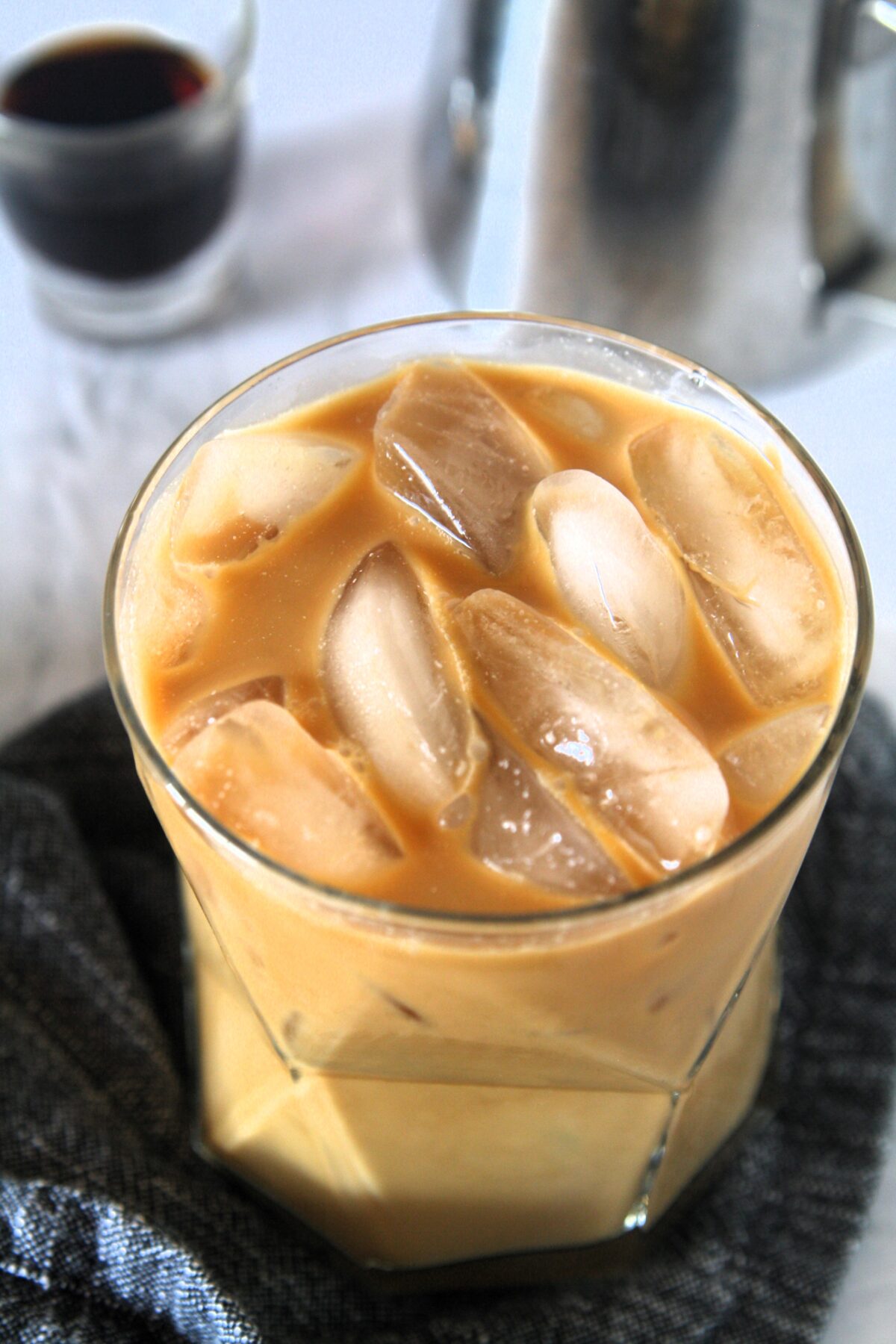 Emma Chamberlain's Cold Brew Iced Coffee Recipe has taken social media by storm. Recreate this refreshing drink with simple ingredients, to be enjoyed over ice or as a base for all kinds of coffee drinks.