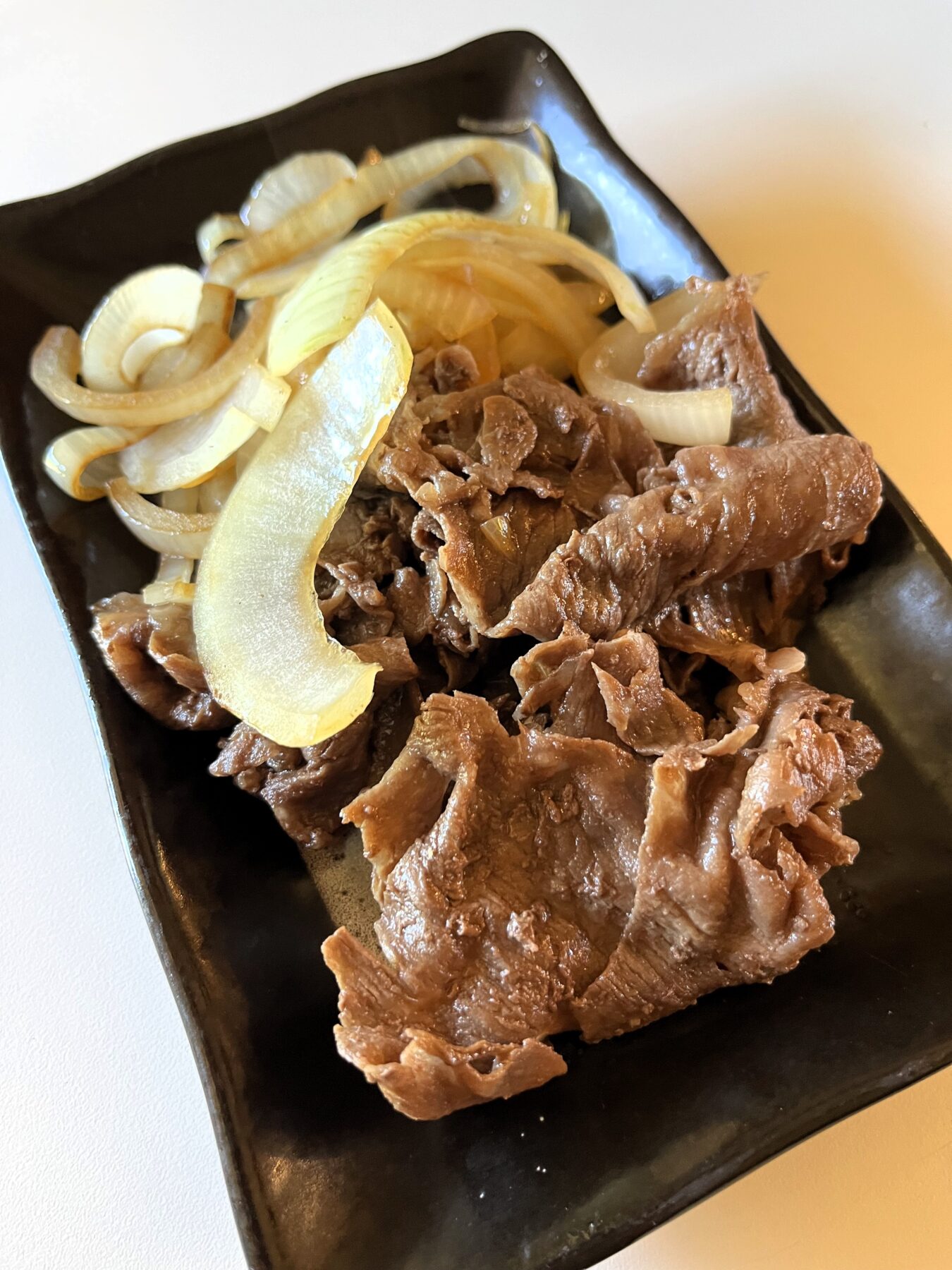 This Easy Bistek Tagalog recipe highlights the rich flavors of Filipino cuisine, featuring tender marinated beef infused with a savory and tangy marinade of calamansi juice, soy sauce, and garlic. Served with steamed rice, it’s a comforting and satisfying dish that will impress family and friends.