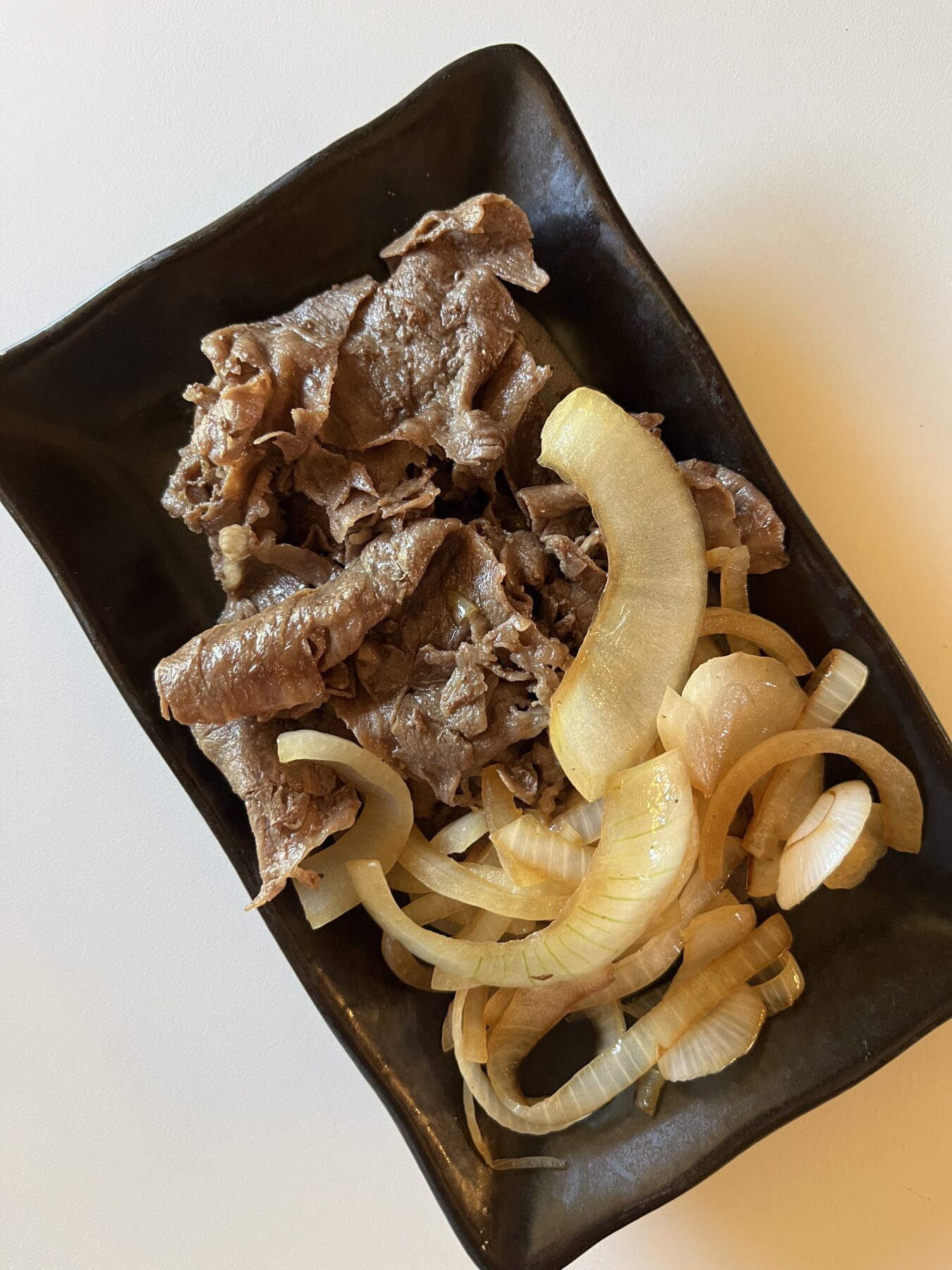 This Easy Bistek Tagalog recipe highlights the rich flavors of Filipino cuisine, featuring tender marinated beef infused with a savory and tangy marinade of calamansi juice, soy sauce, and garlic. Served with steamed rice, it’s a comforting and satisfying dish that will impress family and friends.