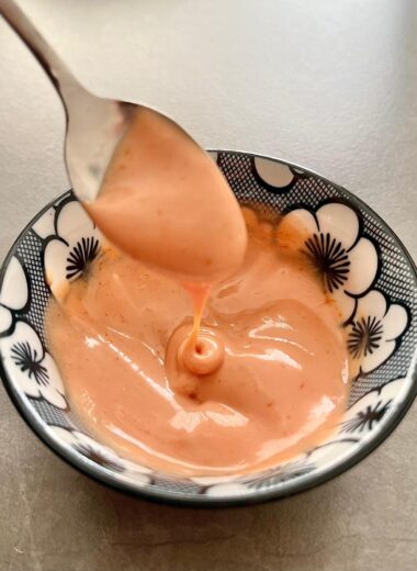 This homemade Yum Yum Sauce recipe delivers that creamy, tangy, and slightly sweet flavor perfect for dipping or drizzling over your favorite dishes. Whether you're enjoying sushi, shrimp, or vegetables, this delicious sauce adds a rich, zesty kick that will take your meal to the next level. Compared to spicy mayo, Yum Yum Sauce offers a milder, sweeter profile but with the same creamy texture that makes it a favorite at Japanese hibachi restaurants and sushi bars.