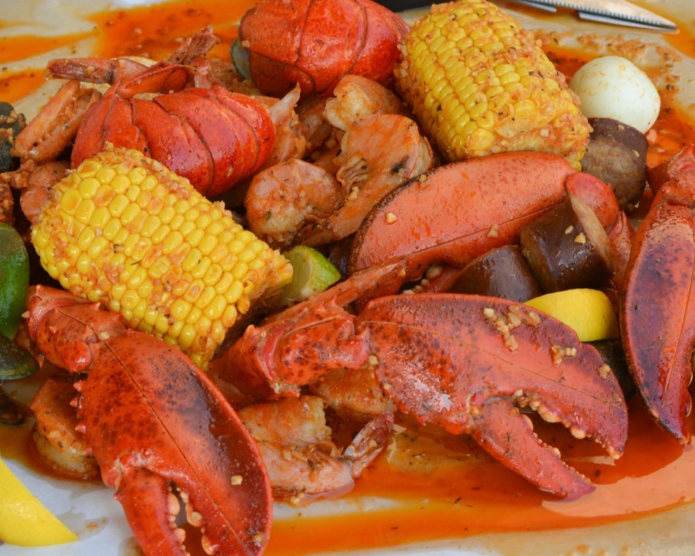 Learn how to make a delicious Angry Crab Shack-inspired seafood boil at home, featuring Cajun seasoning, Asian spices, and their signature Trifecta Sauce for a flavorful dining experience perfect for any occasion.