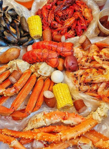 Learn how to make a delicious Angry Crab Shack-inspired seafood boil at home, featuring Cajun seasoning, Asian spices, and their signature Trifecta Sauce for a flavorful dining experience perfect for any occasion.