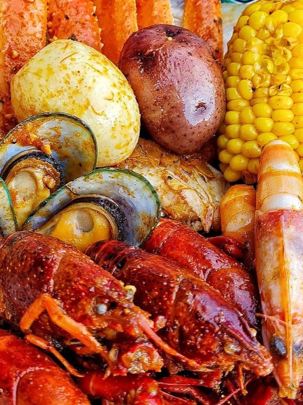 Learn how to make a delicious Angry Crab Shack-inspired seafood boil at home, featuring Cajun seasoning, Asian spices, and their signature Trifecta Sauce for a flavorful dining experience perfect for any occasion.