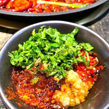 This perfect blend of peanut butter, soy sauce, garlic, chili oil, and Sichuan peppercorns lets you recreate the Copycat Haidilao Hot Pot Dipping Sauce at home!