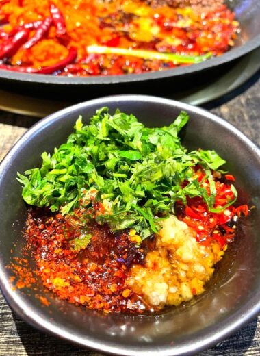 This perfect blend of peanut butter, soy sauce, garlic, chili oil, and Sichuan peppercorns lets you recreate the Copycat Haidilao Hot Pot Dipping Sauce at home!