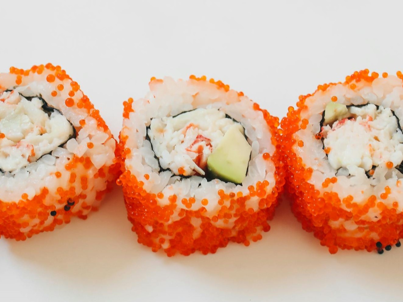 Learn how to make spicy California sushi rolls with imitation crab salad, featuring a delicious combination of creamy avocado, spicy mayo, and seasoned sushi rice. Perfect for sushi lovers looking to recreate this classic roll at home!