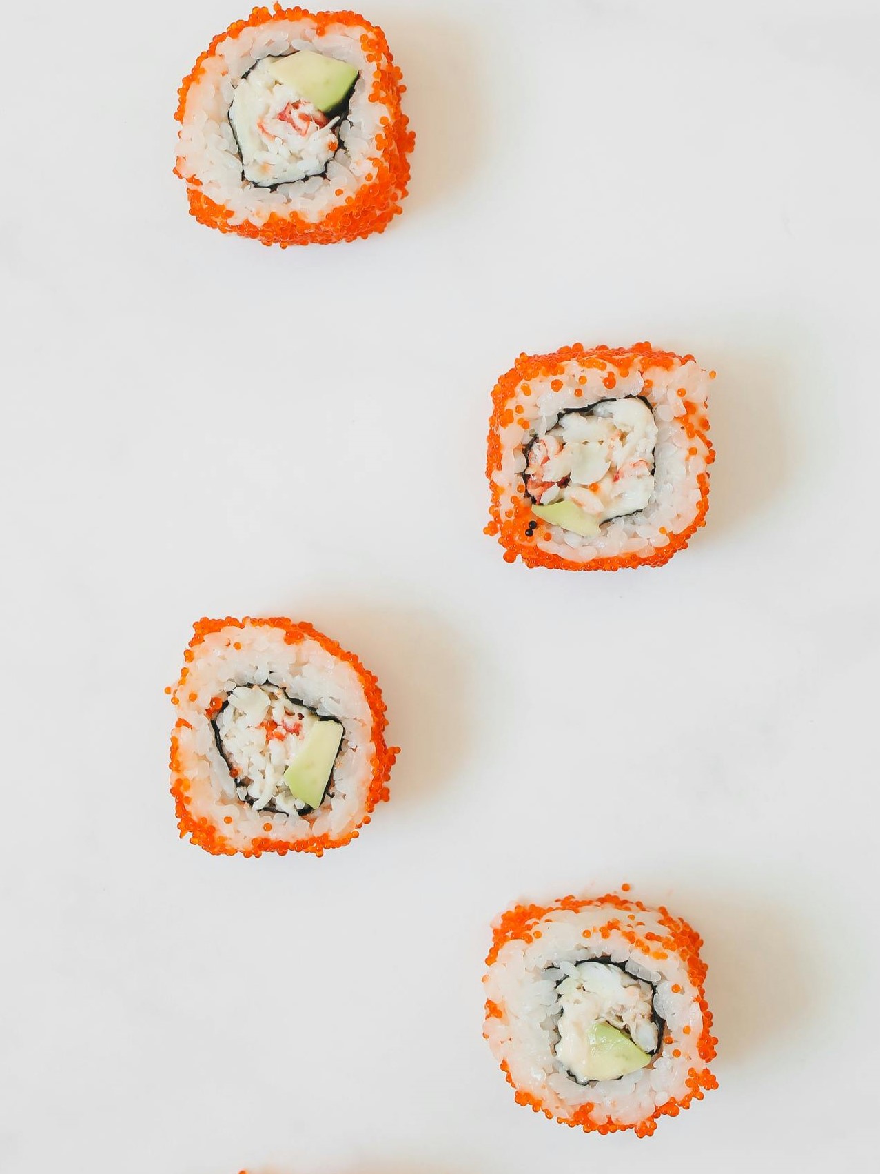 Learn how to make spicy California sushi rolls with imitation crab salad, featuring a delicious combination of creamy avocado, spicy mayo, and seasoned sushi rice. Perfect for sushi lovers looking to recreate this classic roll at home!