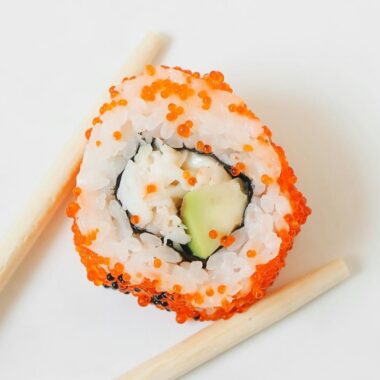 Learn how to make spicy California sushi rolls with imitation crab salad, featuring a delicious combination of creamy avocado, spicy mayo, and seasoned sushi rice. Perfect for sushi lovers looking to recreate this classic roll at home!