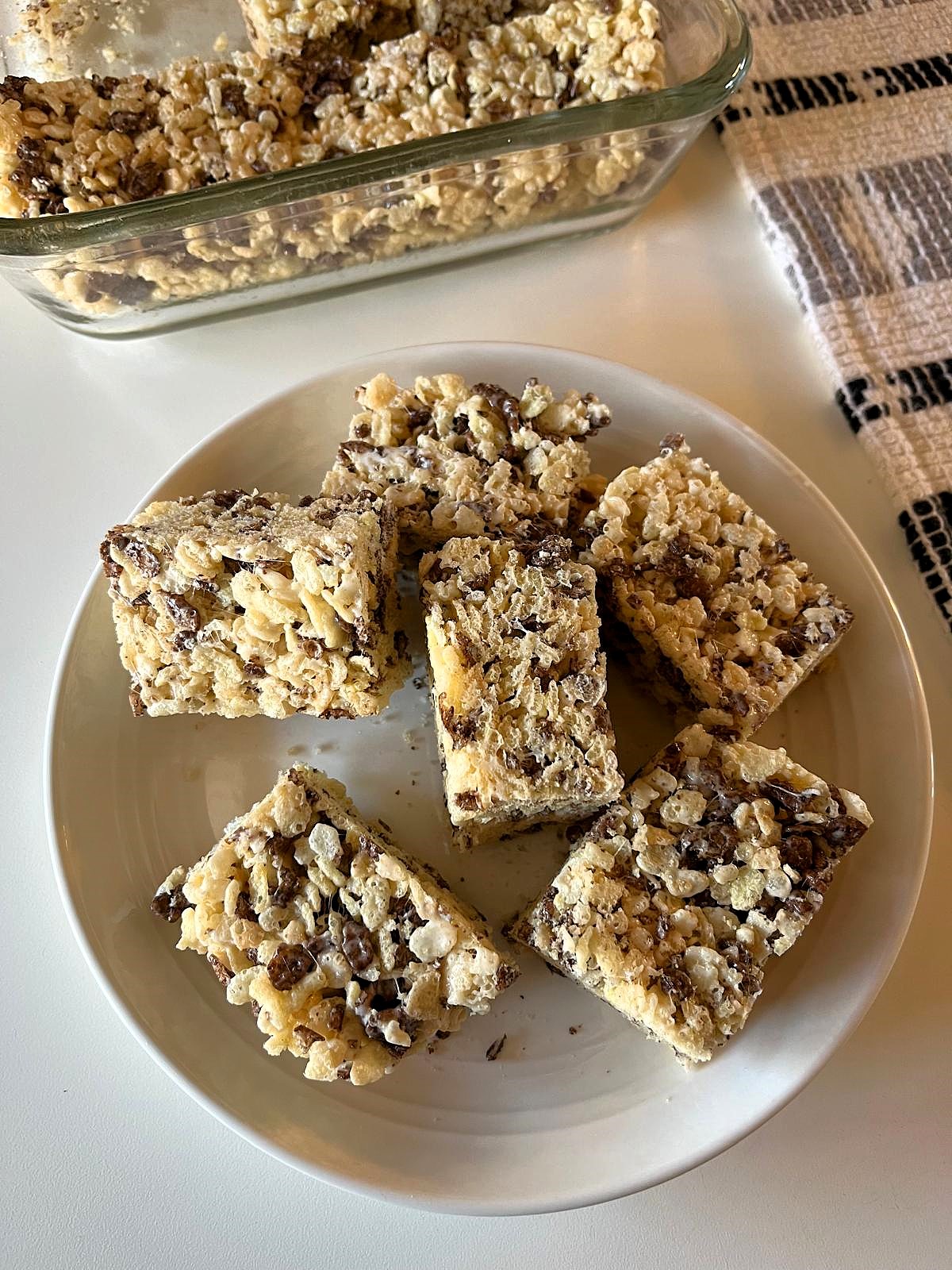 Cocoa Pebbles Rice Krispie Treats is a fun twist on a classic snack that both kids and adults will love. Try switching it up with Fruity Pebbles for a yummy rainbow colored treat!