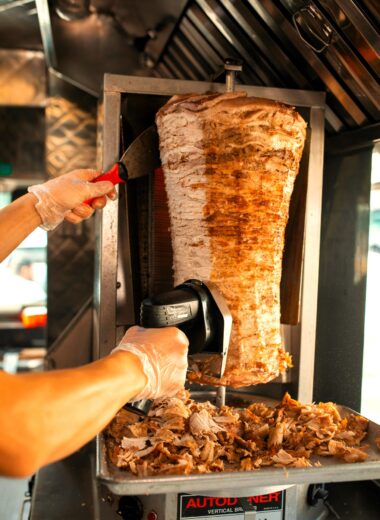 Discover the key differences between döner and gyro, two beloved street foods, including their origins, cultural significance, and variations.