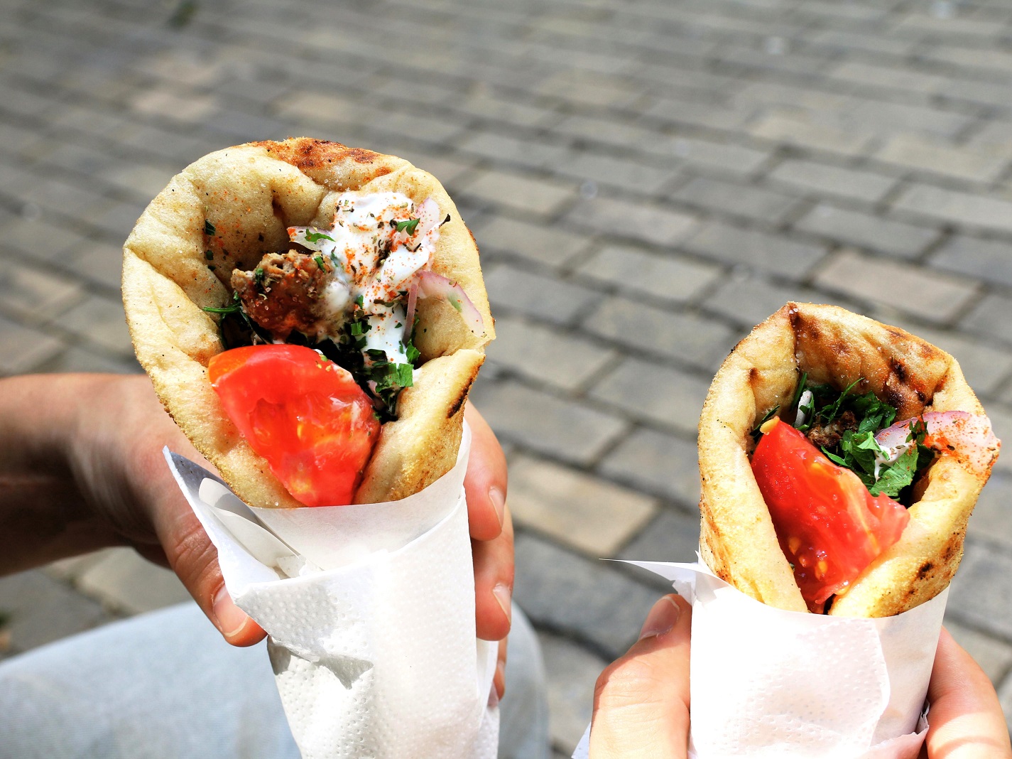 Discover the key differences between döner and gyro, two beloved street foods, including their origins, cultural significance, and variations.