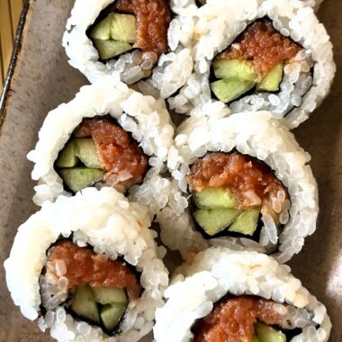 Make these delicious spicy salmon and cucumber sushi rolls at home with this easy recipe! Perfect for sushi lovers, with step-by-step instructions, tips, and ingredient variations for a customizable sushi experience.