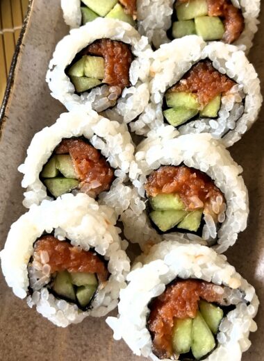 Make these delicious spicy salmon and cucumber sushi rolls at home with this easy recipe! Perfect for sushi lovers, with step-by-step instructions, tips, and ingredient variations for a customizable sushi experience.