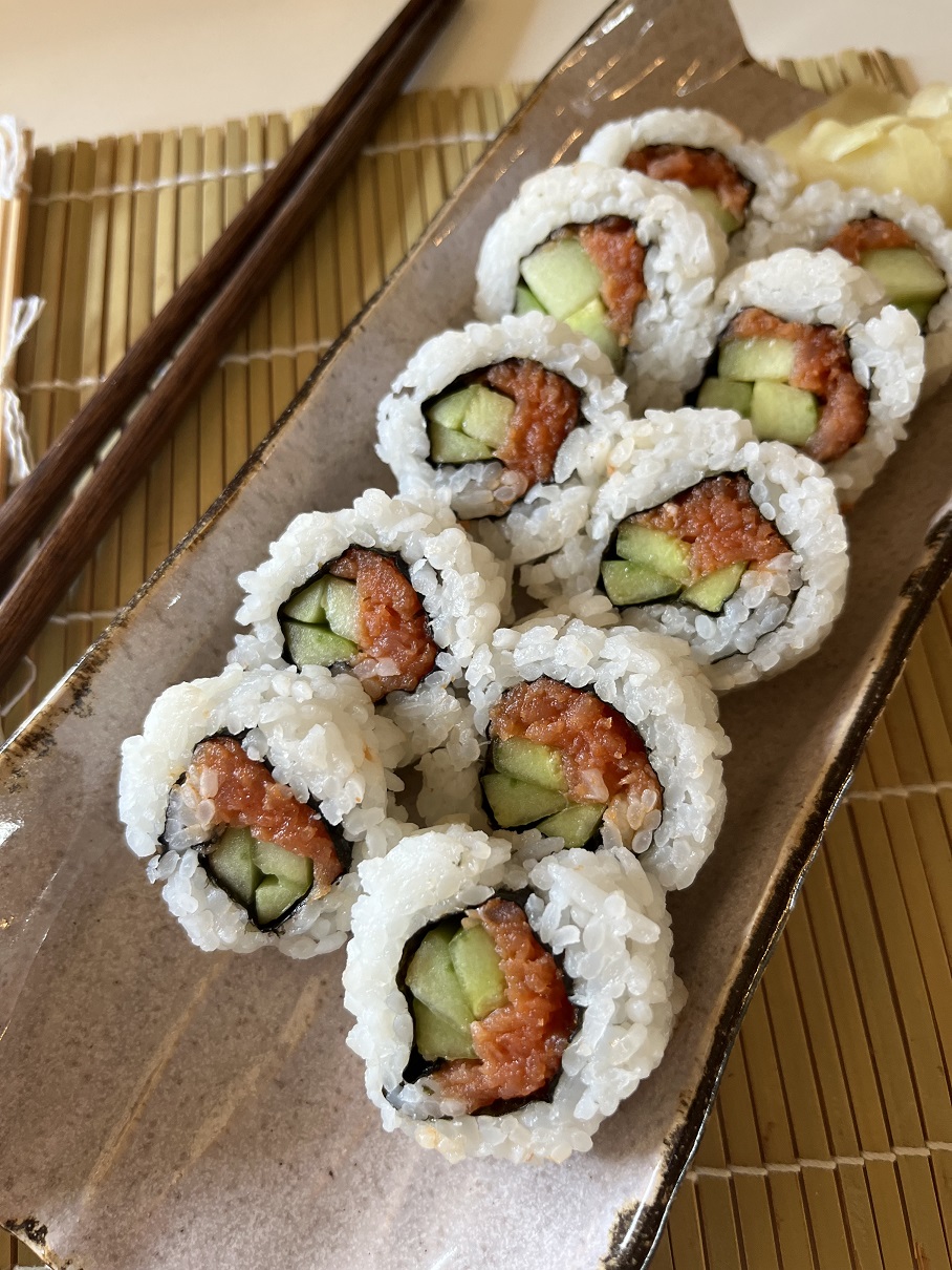 Make these delicious spicy salmon and cucumber sushi rolls at home with this easy recipe! Perfect for sushi lovers, with step-by-step instructions, tips, and ingredient variations for a customizable sushi experience.