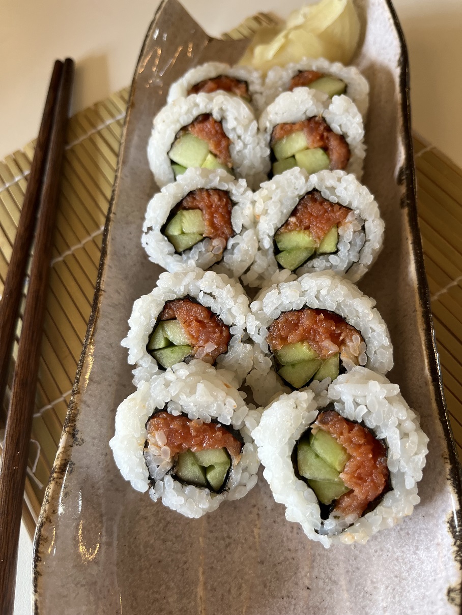 Make these delicious spicy salmon and cucumber sushi rolls at home with this easy recipe! Perfect for sushi lovers, with step-by-step instructions, tips, and ingredient variations for a customizable sushi experience.