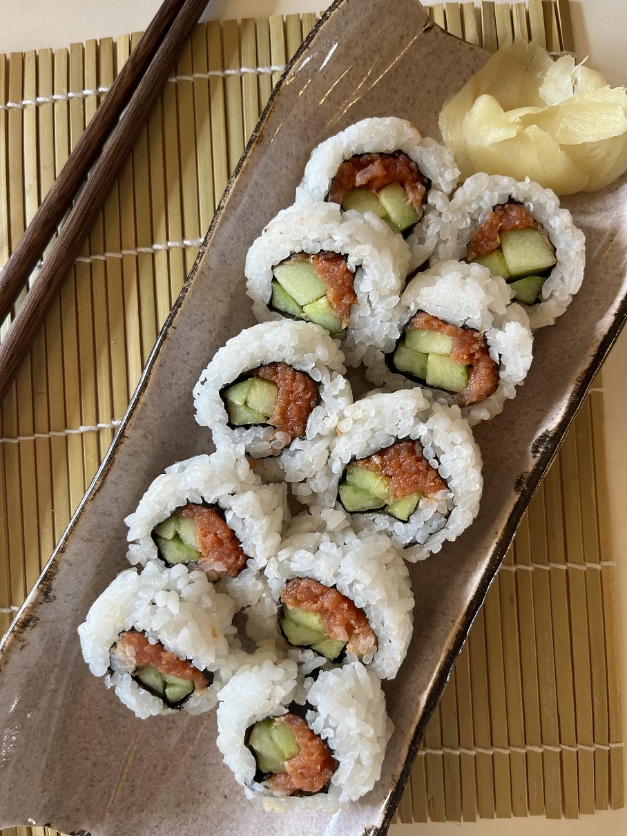 Make these delicious spicy salmon and cucumber sushi rolls at home with this easy recipe! Perfect for sushi lovers, with step-by-step instructions, tips, and ingredient variations for a customizable sushi experience.