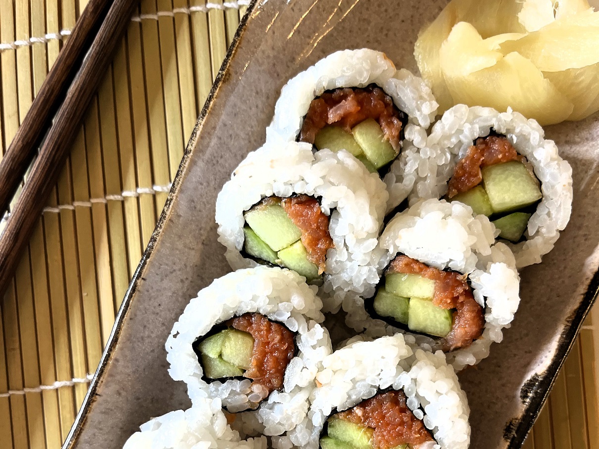 Make these delicious spicy salmon and cucumber sushi rolls at home with this easy recipe! Perfect for sushi lovers, with step-by-step instructions, tips, and ingredient variations for a customizable sushi experience.