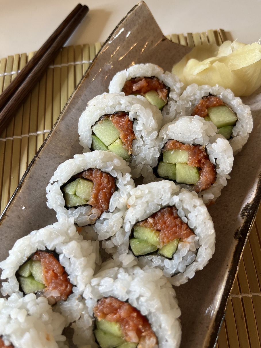 Make these delicious spicy salmon and cucumber sushi rolls at home with this easy recipe! Perfect for sushi lovers, with step-by-step instructions, tips, and ingredient variations for a customizable sushi experience.