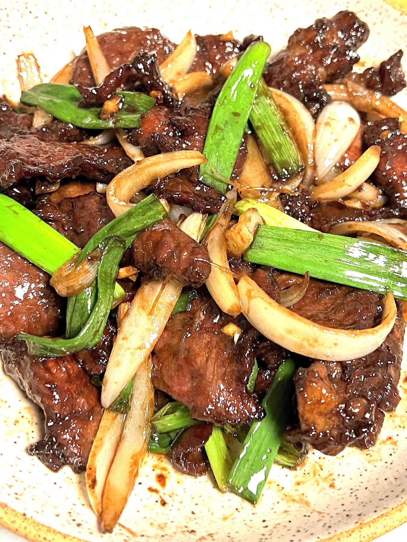 Learn about unique flavor profiles, origins, and key ingredients of Hunan Beef and Mongolian Beef, and how to make Hunan Beef recipe with soy sauce, chili paste, hoisin sauce, and more!