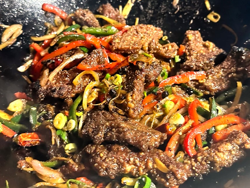 Learn about unique flavor profiles, origins, and key ingredients of Hunan Beef and Mongolian Beef, and how to make Hunan Beef recipe with soy sauce, chili paste, hoisin sauce, and more!